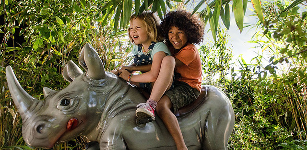 Children playing on a rhino ride at Longleat