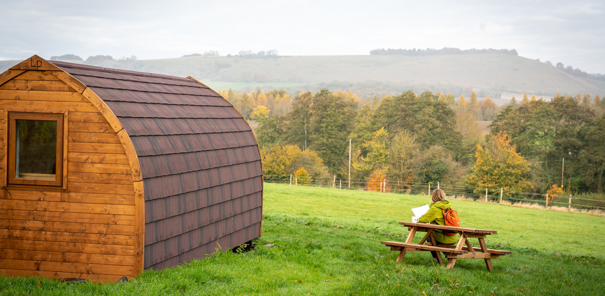A secluded glamping pod with far-reaching countryside views
